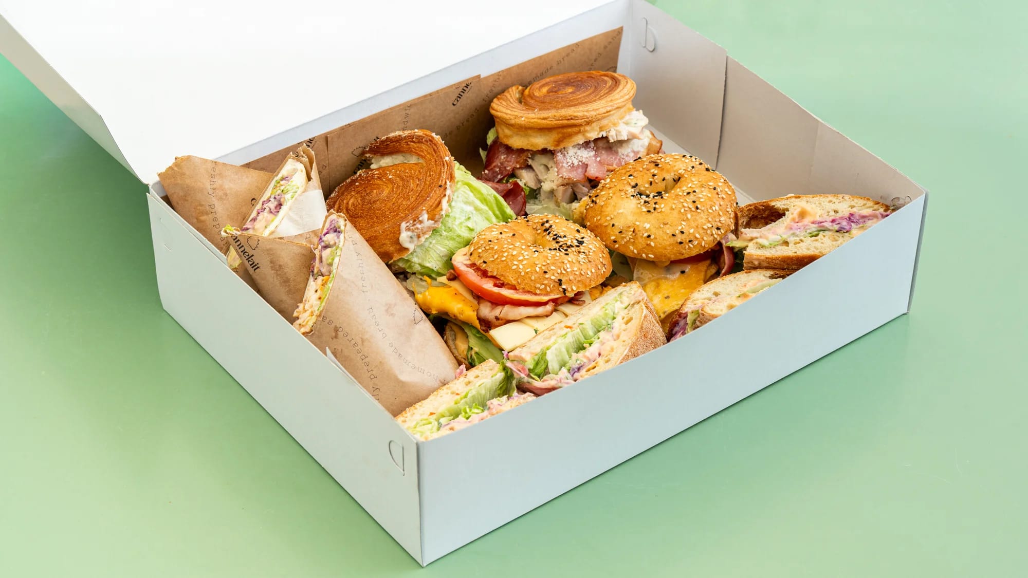 the classics platter with chicken caesar rolls, wraps and burgers