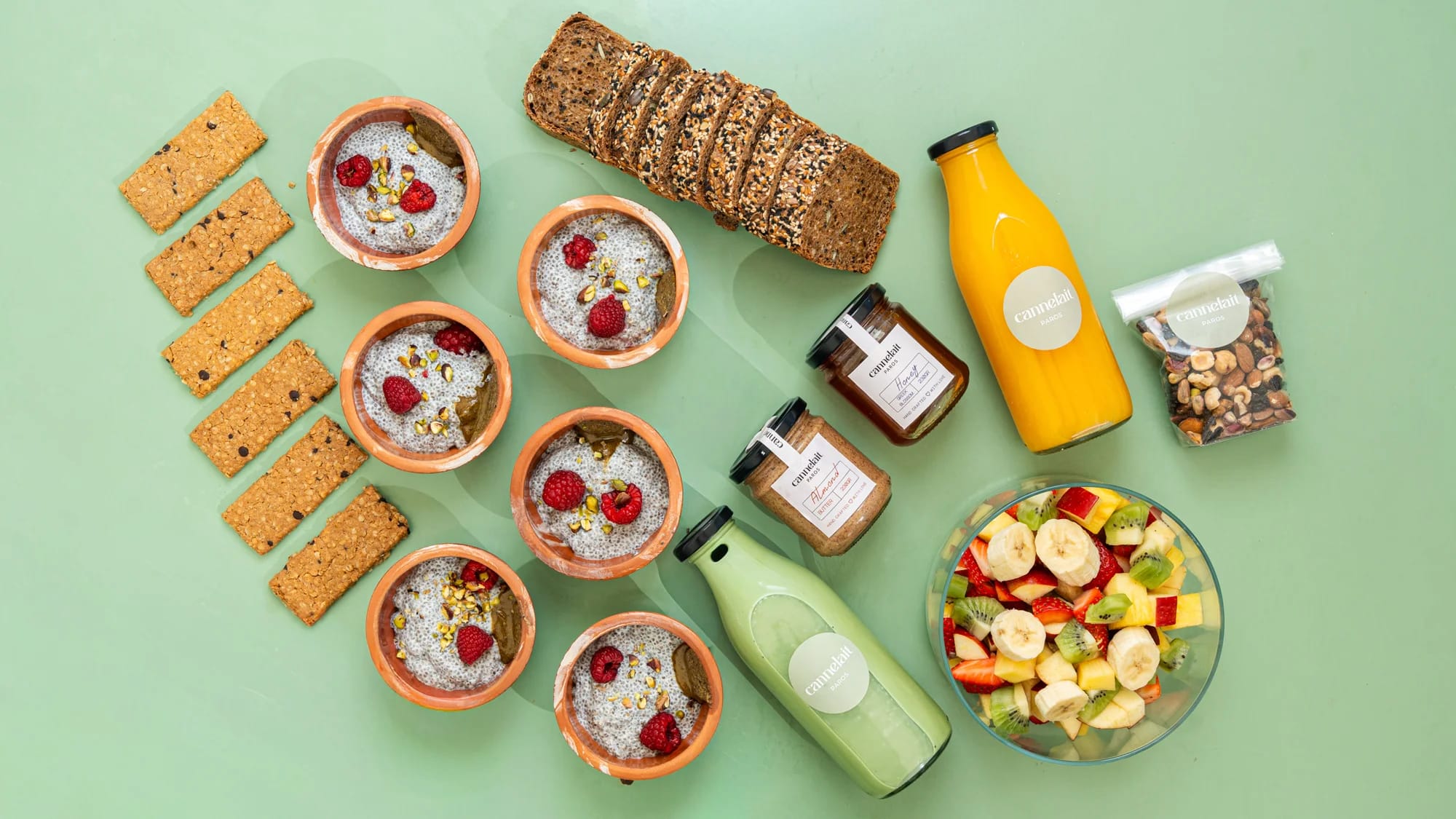wellness breakfast with chia pudding, protein bars, multiseed bread and matcha