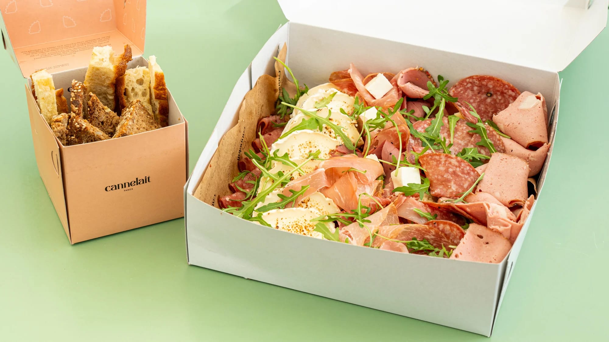 charcuterie and cheese board with cured meats, cheeses and breads